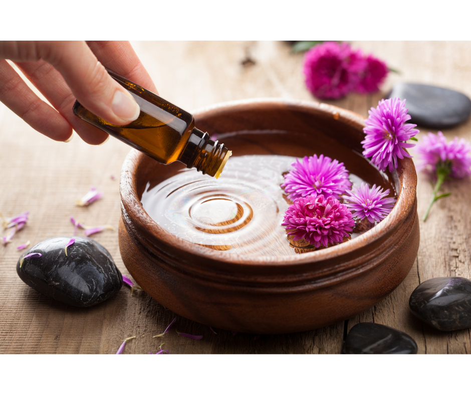 Lavender essential oil drops into wooden bowl for getting better grades.