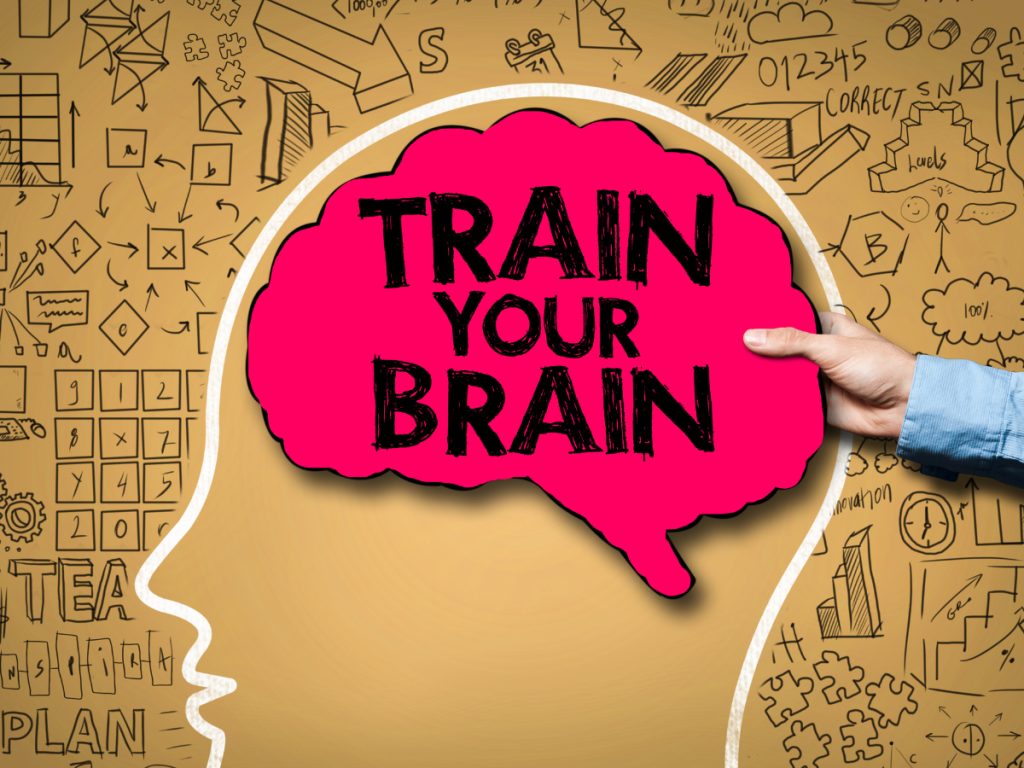 Drawing of a head with "train your brain" in the text in red and how to decrease symptoms of stress by looking for things to be grateful for.